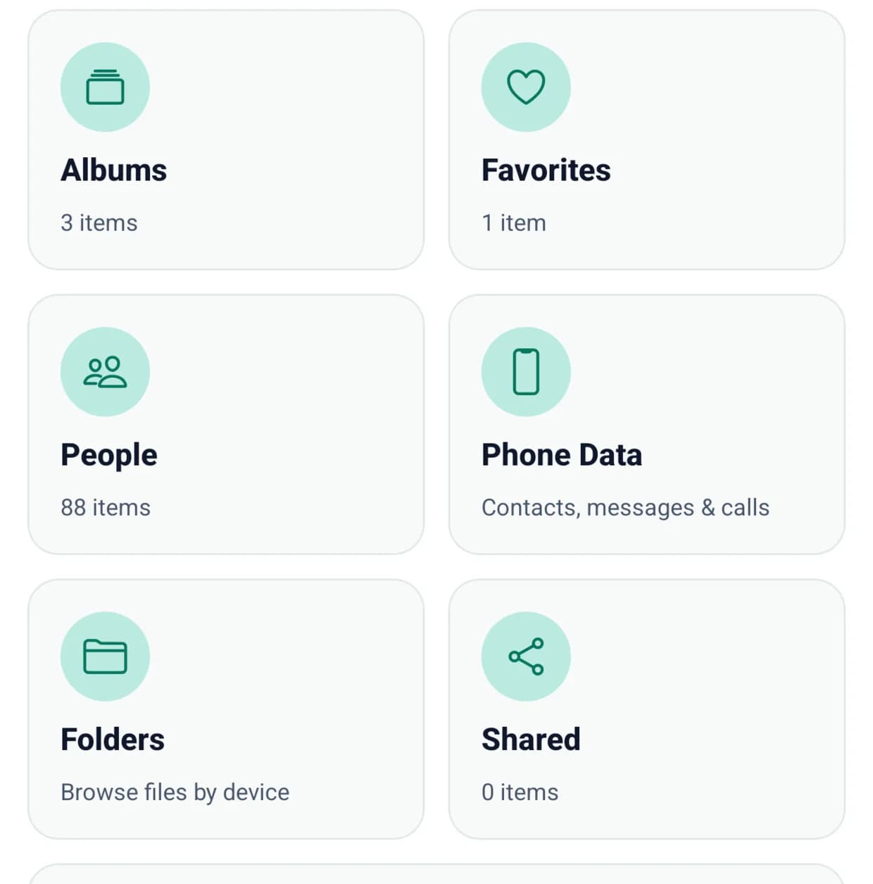 The BigMind Home library, with Albums, Favorites, People, Phone Data, Folders and Shared