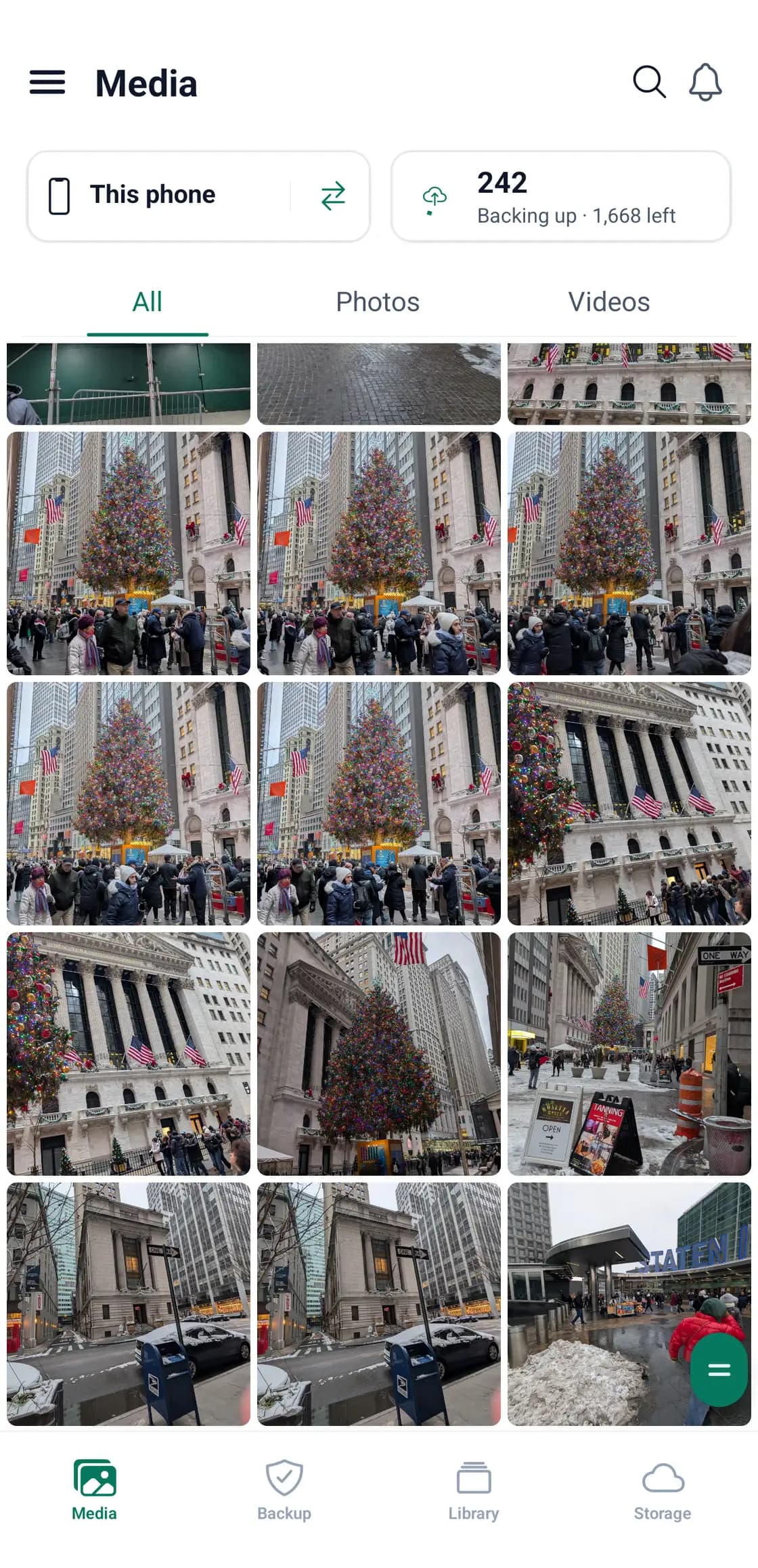 The Media screen in the BigMind Home app showing a grid of photos with 242 backed up and 1,668 left