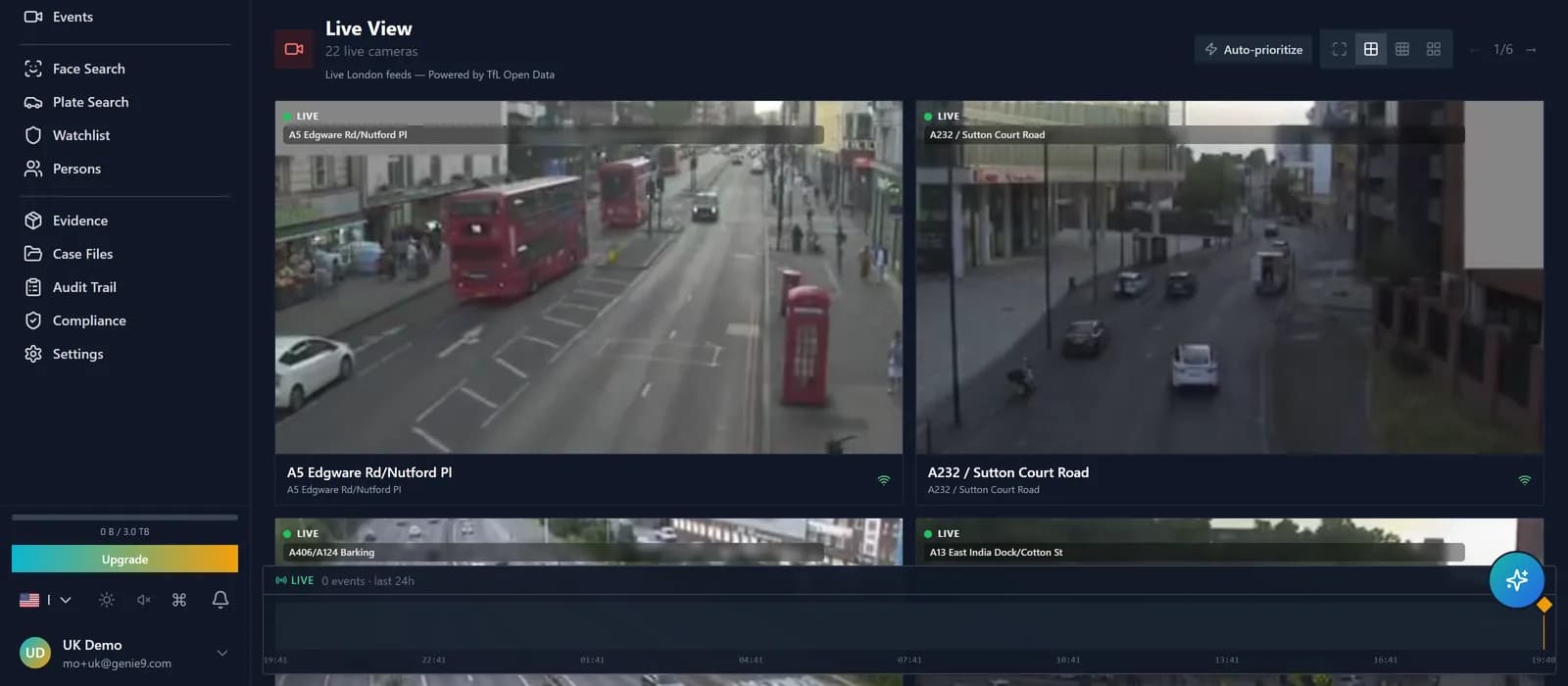 Live View grid showing layout selector with one tile mid-fullscreen transition and stream-health badges on each feed